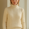 Elara · Pull torsadé en maille douce à col roulé