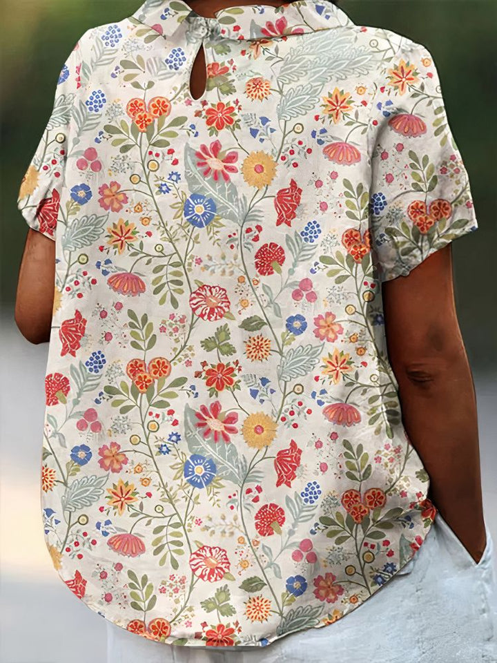 Elara · Élégante Blouse Fleurie