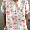 Elara · Élégante Blouse Fleurie