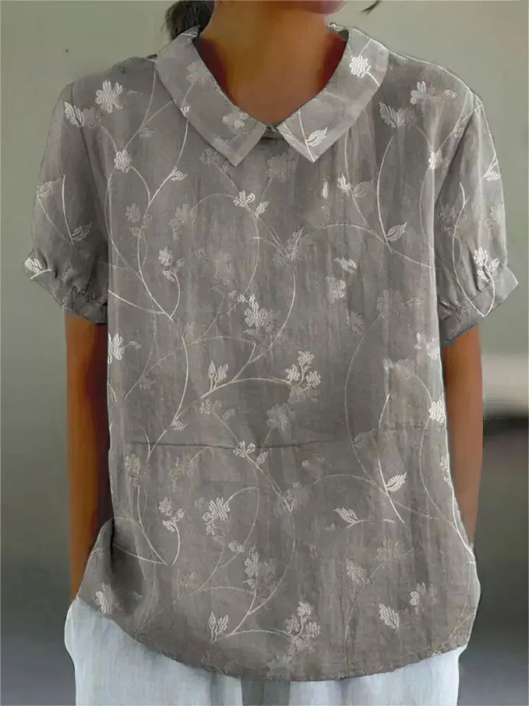 Elara · Élégante Blouse Fleurie