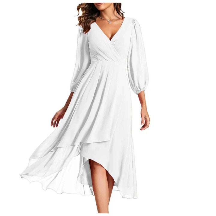 VITTORIA | Robe élégante avec ourlet asymétrique et manches fluides Look raffiné pour chaque occasion
