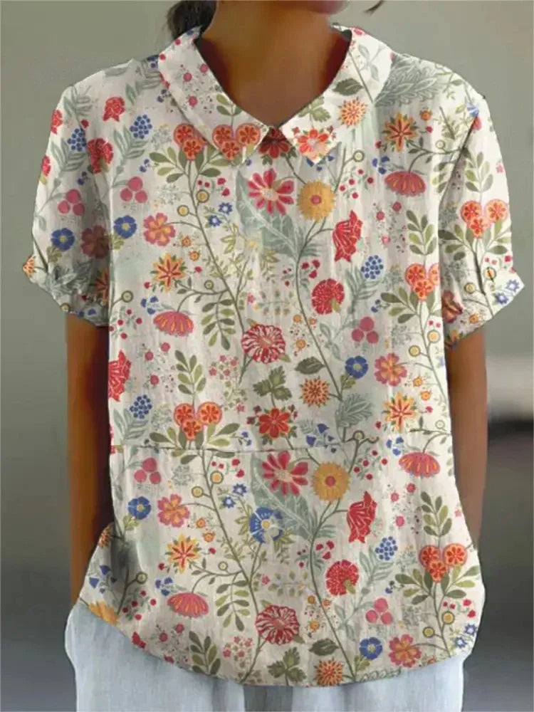 Elara · Élégante Blouse Fleurie