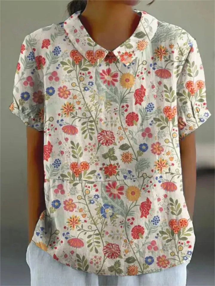 Elara · Élégante Blouse Fleurie