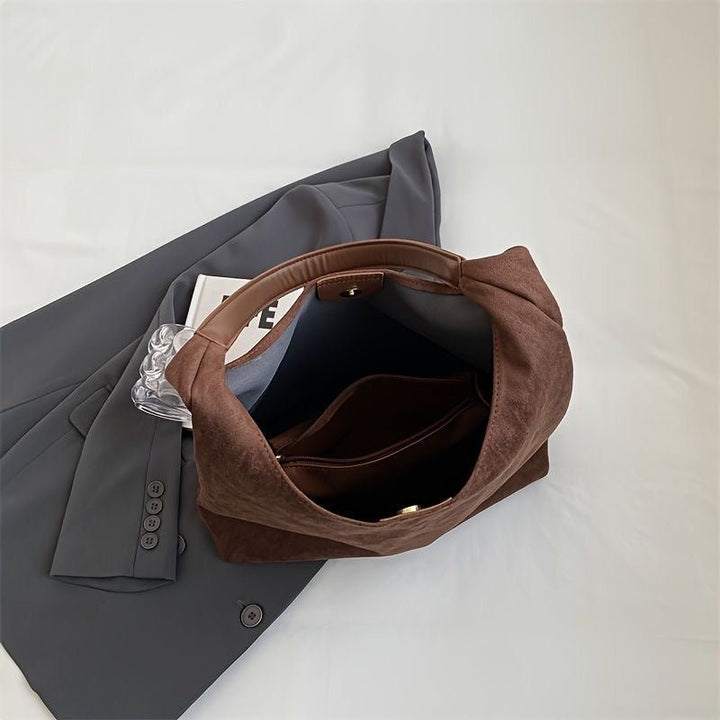 Elara · Sac Dana
